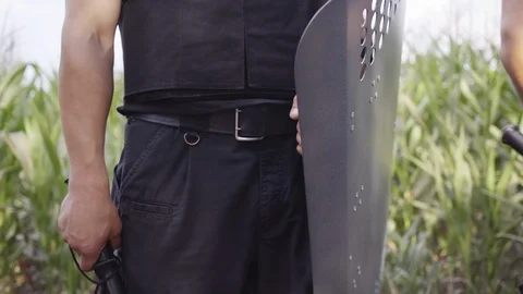 Security guards in full equipment, helmet, shield, machine gun, body armor Stock Footage 95206630