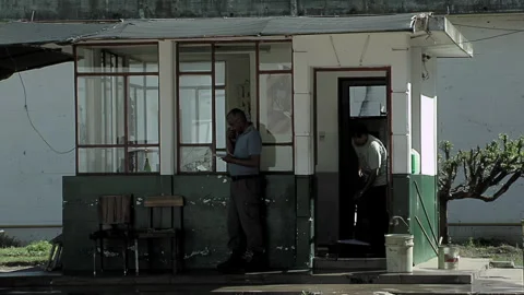 Security Guards at Prison Checkpoint Entrance Performing Daily Routine Tasks 4K Stock Footage 337329641