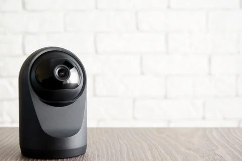 Security IP camera on the table in the apartment Foto stock