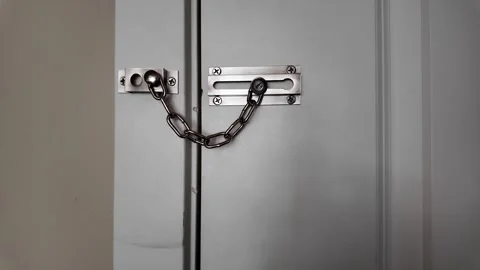 Security Lock Chain on a Metal Door Close-Up Stock Footage 263928273