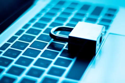 Security lock on a computer keyboard by keys /Information Security System, ra Stock Photos