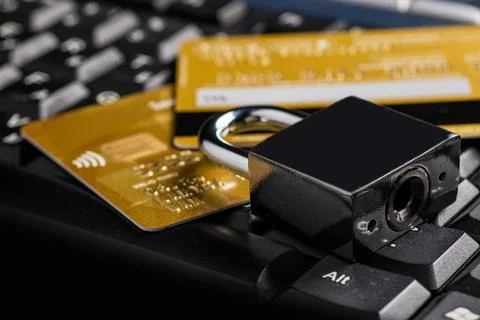 Security lock on credit cards with computer keyboard - credit card data sec.. Stock Photos