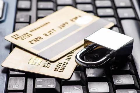 Security lock on credit cards with computer keyboard - credit card data sec.. Stock Photos