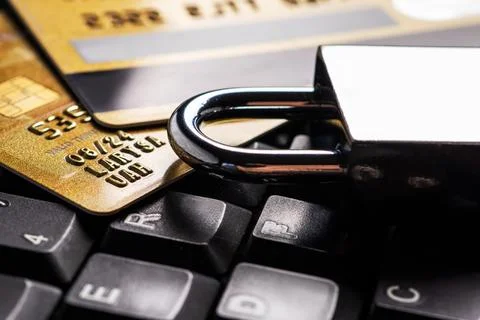 Security lock on credit cards with computer keyboard - credit card data sec.. Stock Photos