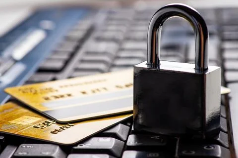 Security lock on credit cards with computer keyboard - credit card data secur 스톡 사진