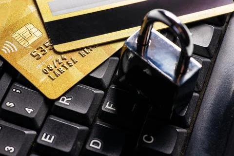 Security lock on credit cards with computer keyboard - credit card data sec.. Stock Photos