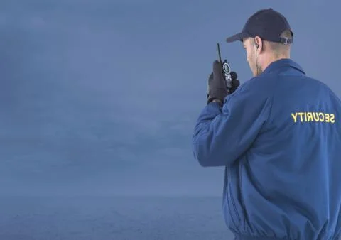 Security man outside with blue background clouds Foto stock