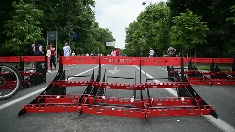 Security mobile vehicle barrier is seen on a pedestrian street 스톡 동영상 196115634