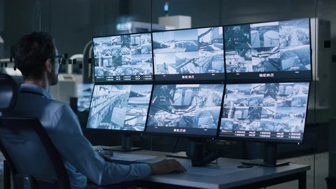 Security Operator Controls Proper Functioning of Workshop Production Line Video stock 125481104