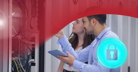 Security padlock icon over man and woman checking computer server against red Stock Photos