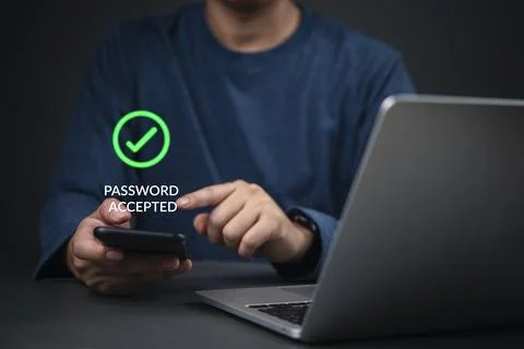 Security, Password Hands holding smartphone show password accepted next to .. Stockfoto's