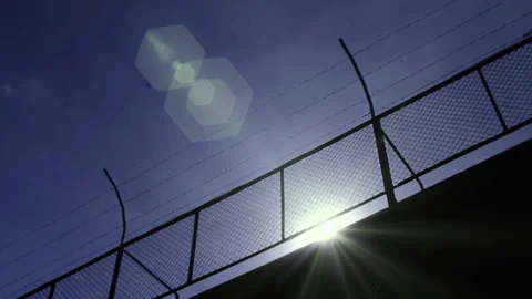Security Perimeter Fence With Barbed Wire, Detention Facility Stock Footage 234127489