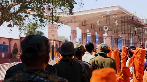 Security Personnel Managing Pilgrim Crowd Near Ram Mandir Temple Complex in Stock Footage 338402479