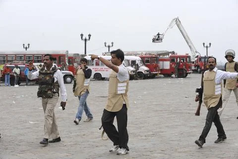 Security persons asking media move Taj Mahal hotel ; terrorist attack by D... Stock Photos