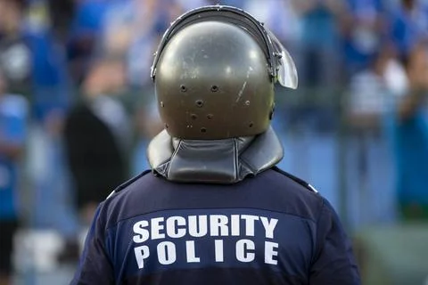 Security police officer Security police officer with protective helmet see... Stock Photos