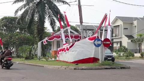The security post is decorated with a red and white theme Stock Footage 247874482