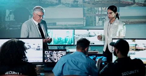 Security, presentation and team in control room with man for strategy, plan.. Foto stock