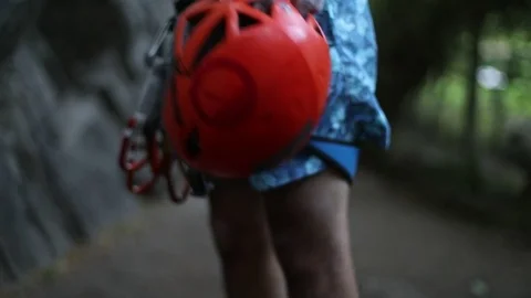 Security rock climbing equipment. Man with harnesses, quickdraws and helmet. 스톡 동영상 73237294
