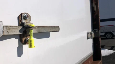 Security Seal Attached To Cargo Shipping Trailer For Anti-Theft Protection Stock Footage 265903454