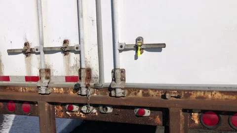 Security Seal Attached To Cargo Shipping Trailer For Anti-Theft Protection Stock Footage 265903471