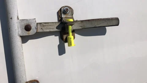 Security Seal Attached To Cargo Shipping Trailer For Anti-Theft Protection Stock Footage 265904000