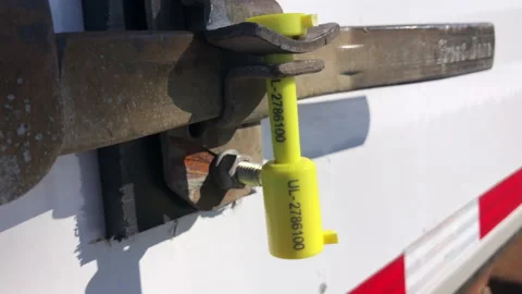 Security Seal Attached To Cargo Shipping Trailer For Anti-Theft Protection Stock Footage 265904001