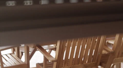 Security Shutters coming down on table and chairs Vídeo Stock 39712037
