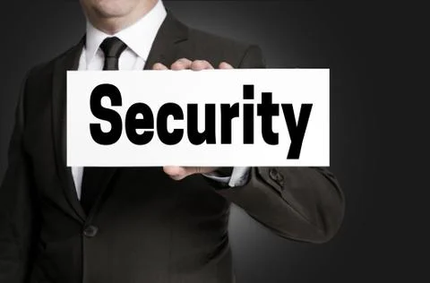 Security sign is held by businessman Stock Photos