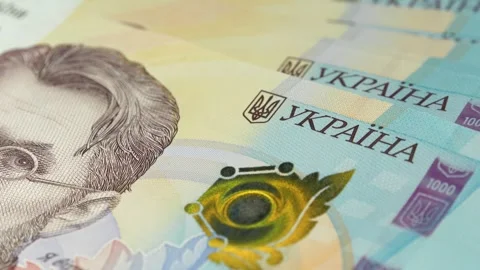 Security signs and elements on banknotes 1000 Hryvnia. Ukrainian paper money Stock Footage 254735120