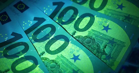 Security signs and elements on euro banknotes glow under ultraviolet light Stock Footage 264780082