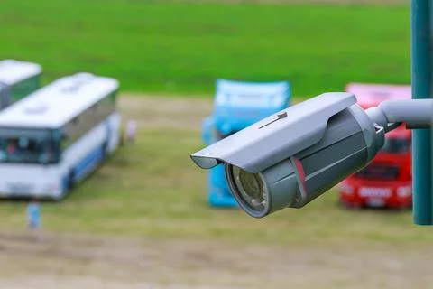 Security Silver CCTV camera. Professional Security cameras scanning the stree Stock Photos