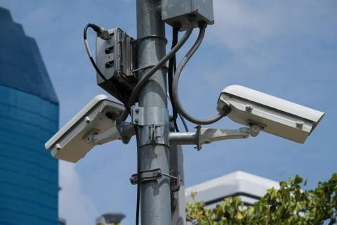 Security surveillance camera  and blue sky Foto stock