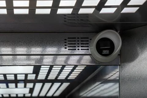 Security surveillance camera inside modern elevator cabin 库存照片