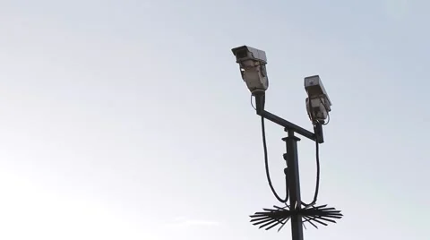 Security Surveillance CCTV Camera Pole Spikes Abstract Blue Sky Background Stock-Footage 42726685
