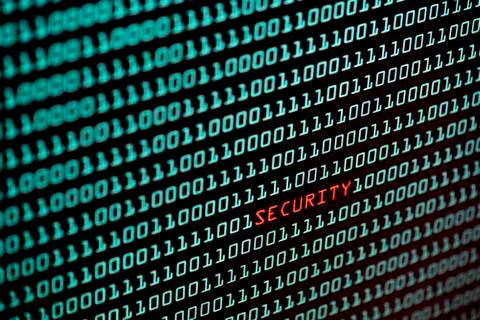 Security text and binary code concept from the desktop screen, selective focu Stock Photos