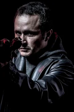 Security, thief, armed man with black leather jacket, dangerous Stock Photos