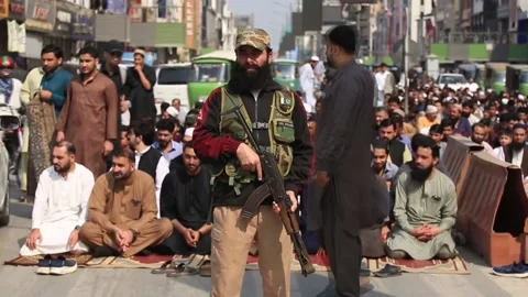 Security tightens as Muslims hold Friday prayers in Peshawar, PAKISTÁN, PK - 27  Stock Footage 329767228