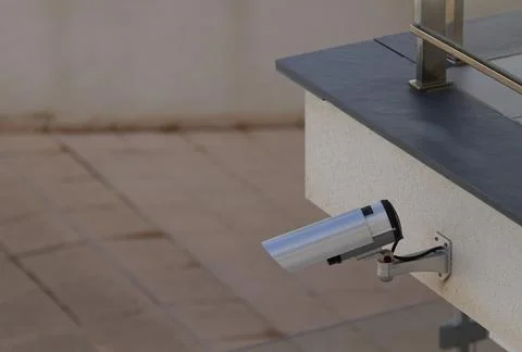 Security video camera on the facade of the building. Stock Photos