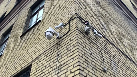 Security video camera moving to scan the area for surveillance purposes. Robotic Stock Footage 150001239