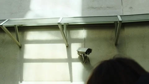 Security video camera moving to scan the area for surveillance purposes. Robotic Stock Footage 152185430