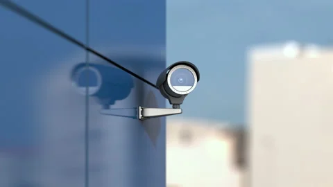 Security video camera scanning city street area for surveillance purposes Stock Footage 152151619