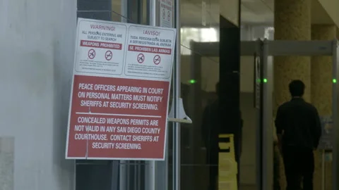 Security Warning Signs at Courthouse Entrance 스톡 동영상 343959343