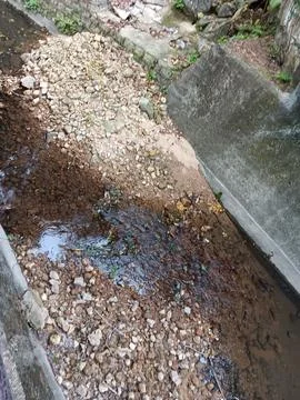 Sediment in water stream. Stock Photos