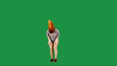 Seductive Dancer in Jeans Shorts and Tied Checkered Shirt on Green Screen Stock Footage 111851024