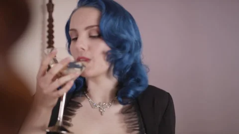 Seductive female drinking a cocktail Stock Footage 109487224