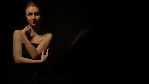 Seductive ladies dancing, stroking body with gambling chip, inviting for game Stock Footage 104022175