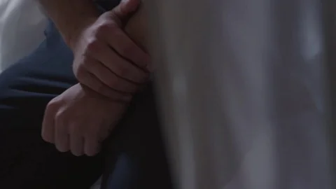 Seductive man touching his hands on bed in slow motion Video stock 73026477