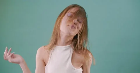 Seductive while dancing and eating candy Stock Footage 160159277