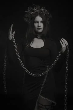 Seductive woman with chains Stock Photos