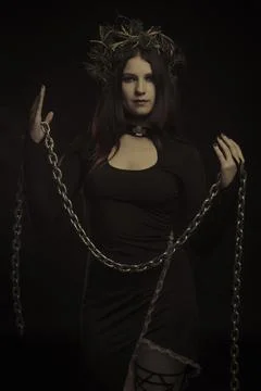 Seductive woman with chains Stock Photos